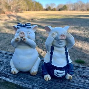 A pair of Wooden Pig Figurines